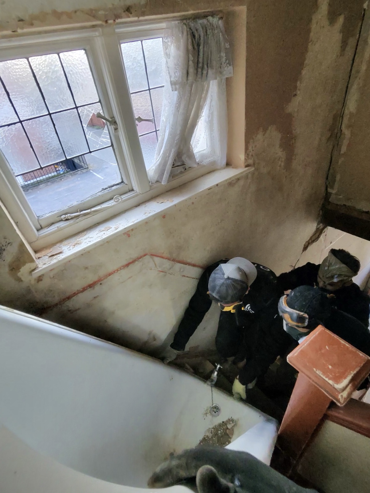 Bathroom demolition – fittings and wall tiles stripped