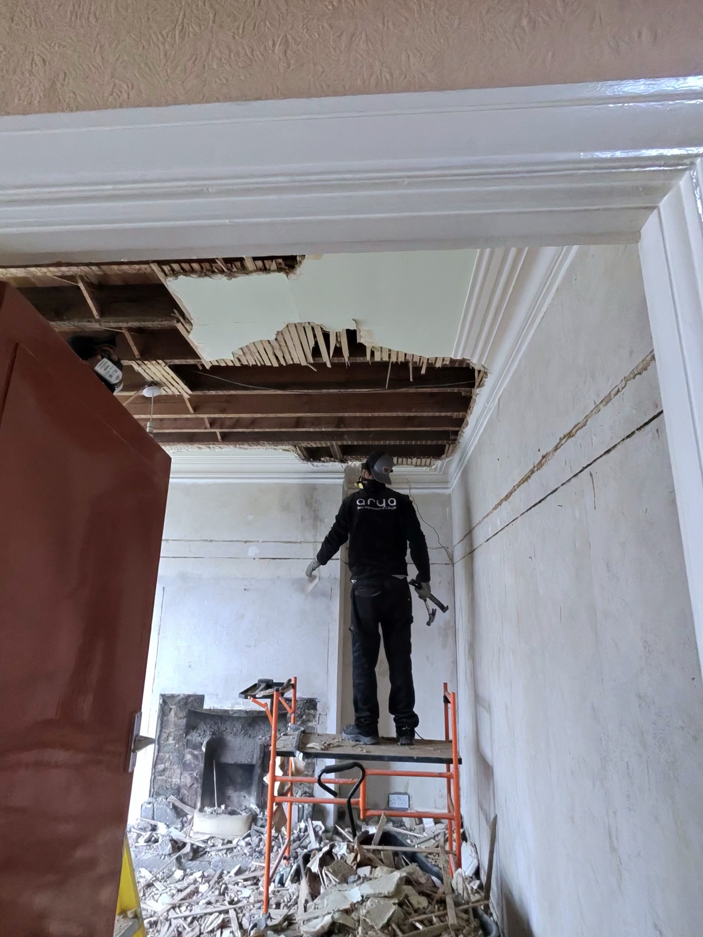Ceiling demolition – living room structure exposed