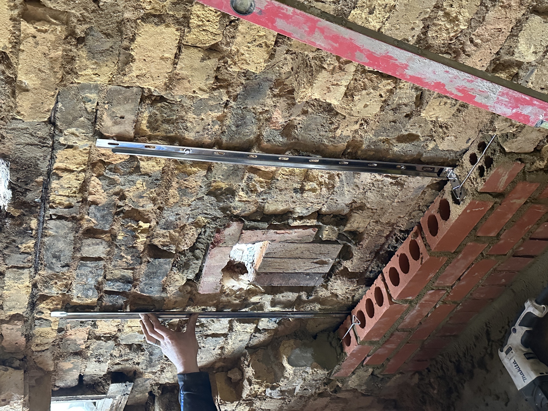 Steel lintel positioned for installation