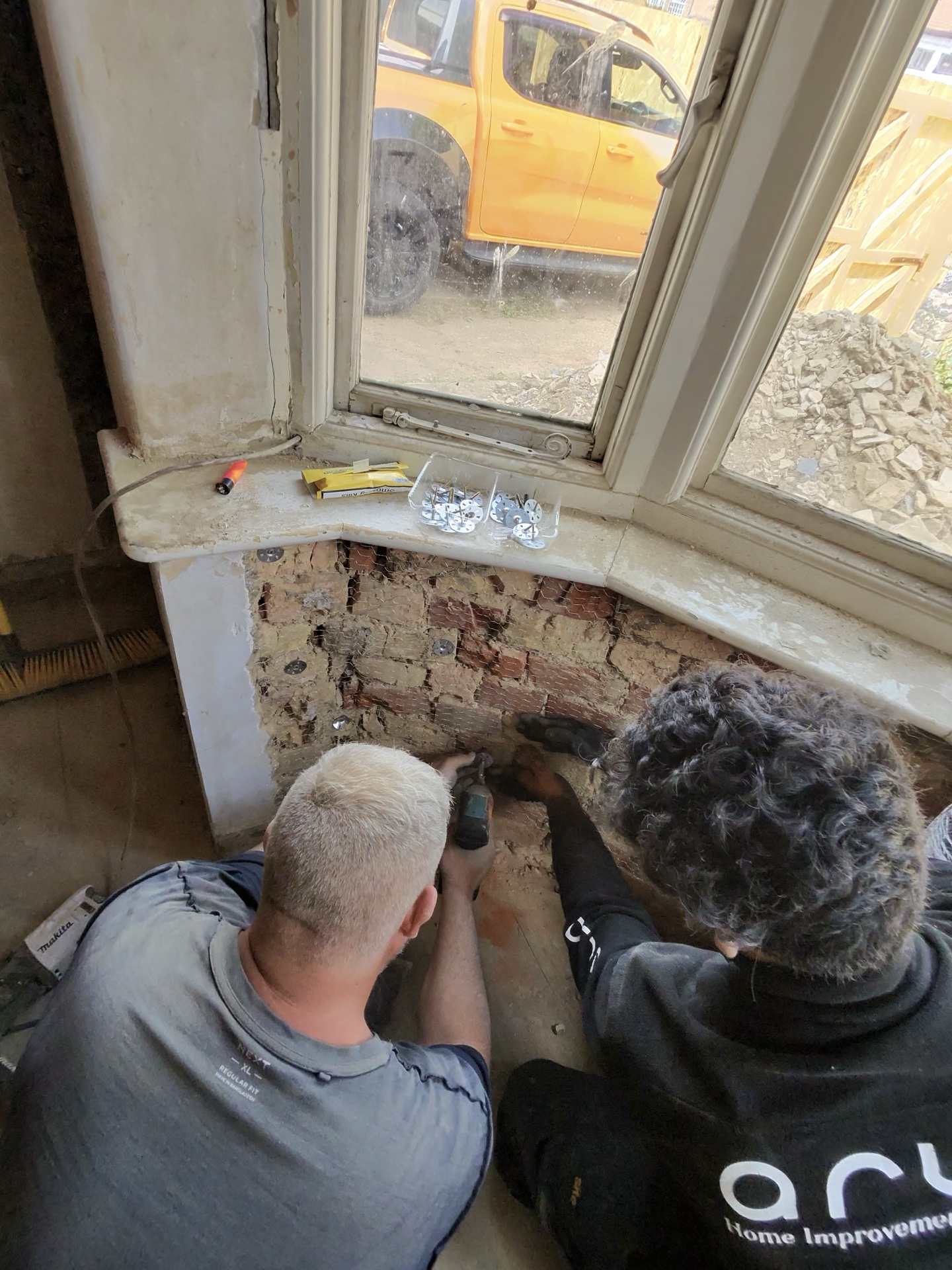 Render removal and crack exposure